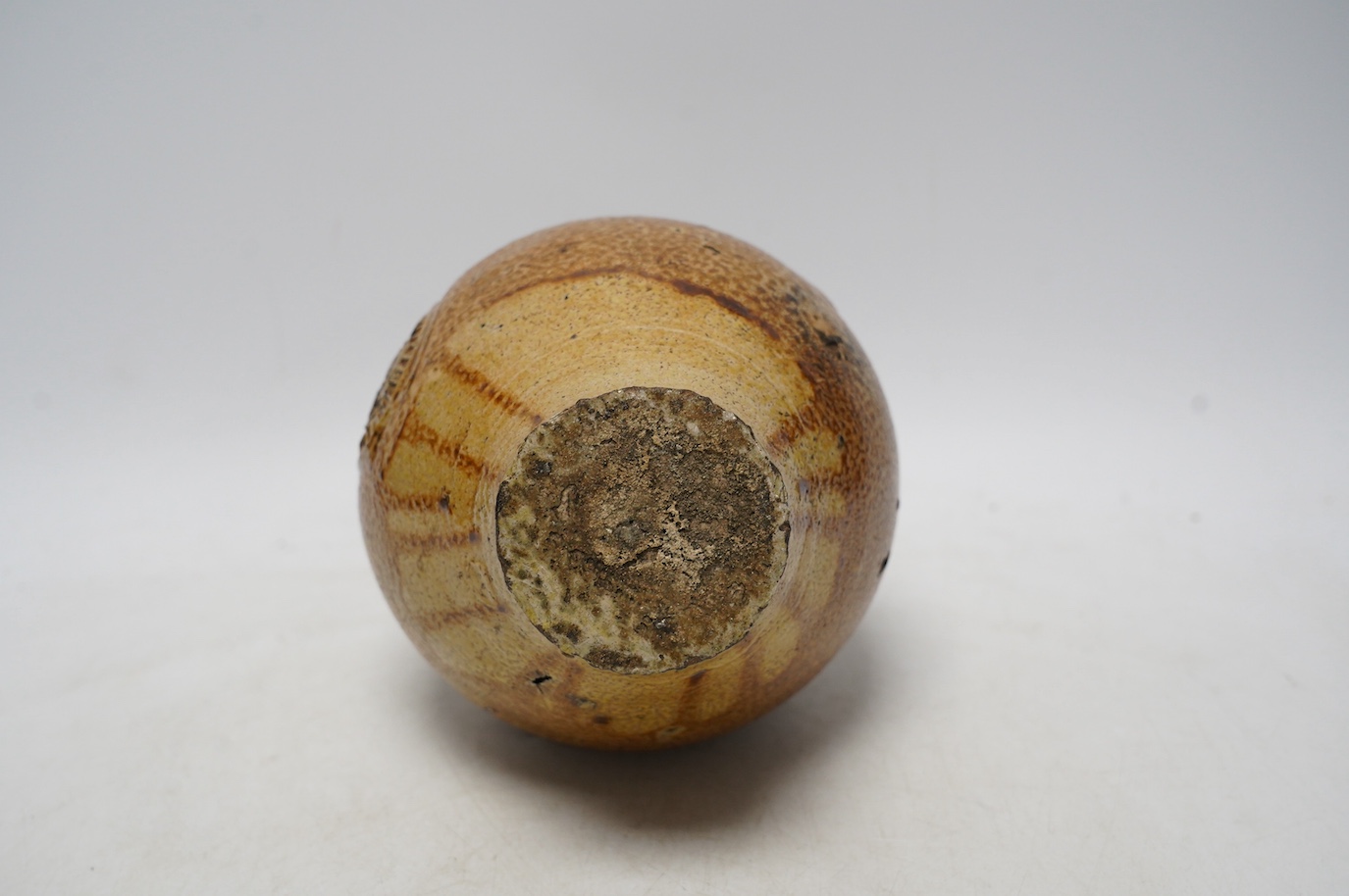 A 17th century Rhenish saltglazed Bellarmine, 23cm. Condition - commensurate with age